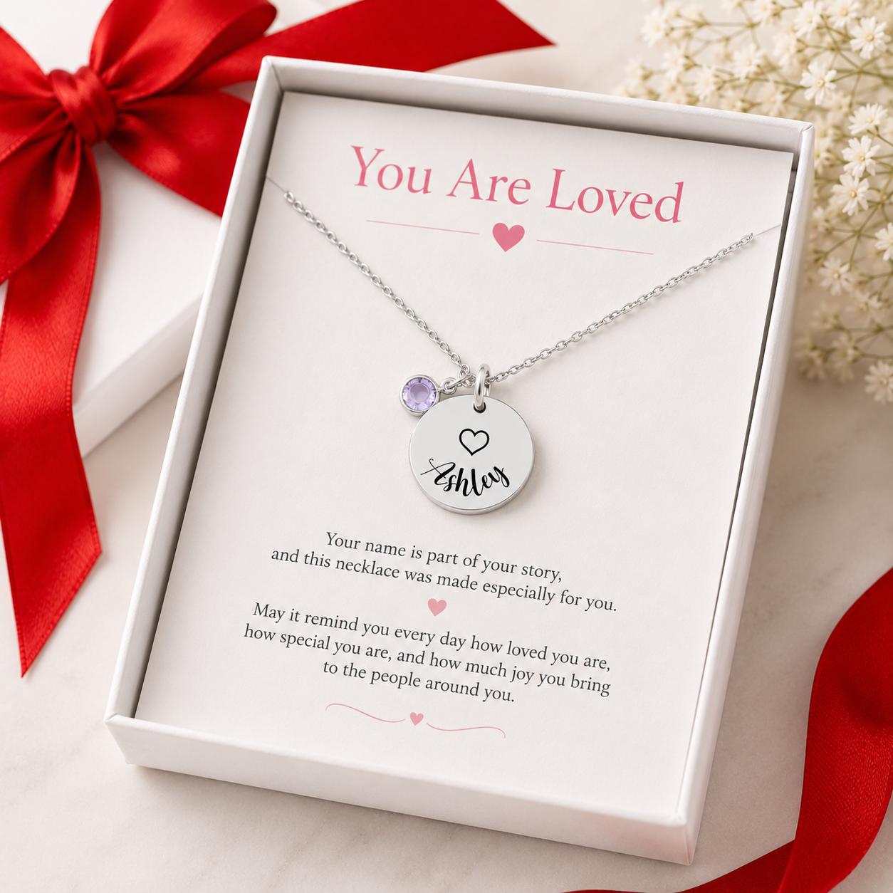 Personalized Child Necklace - close-up of the custom engraving