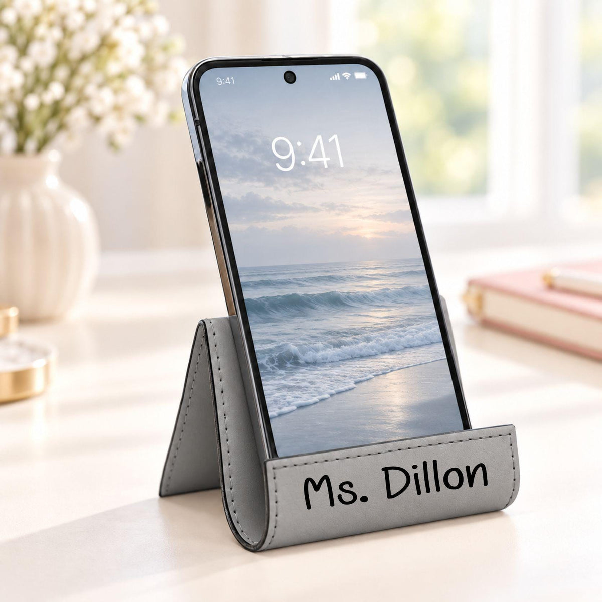 Grey phone stand engraved Ms. Dillon, a teacher gift idea