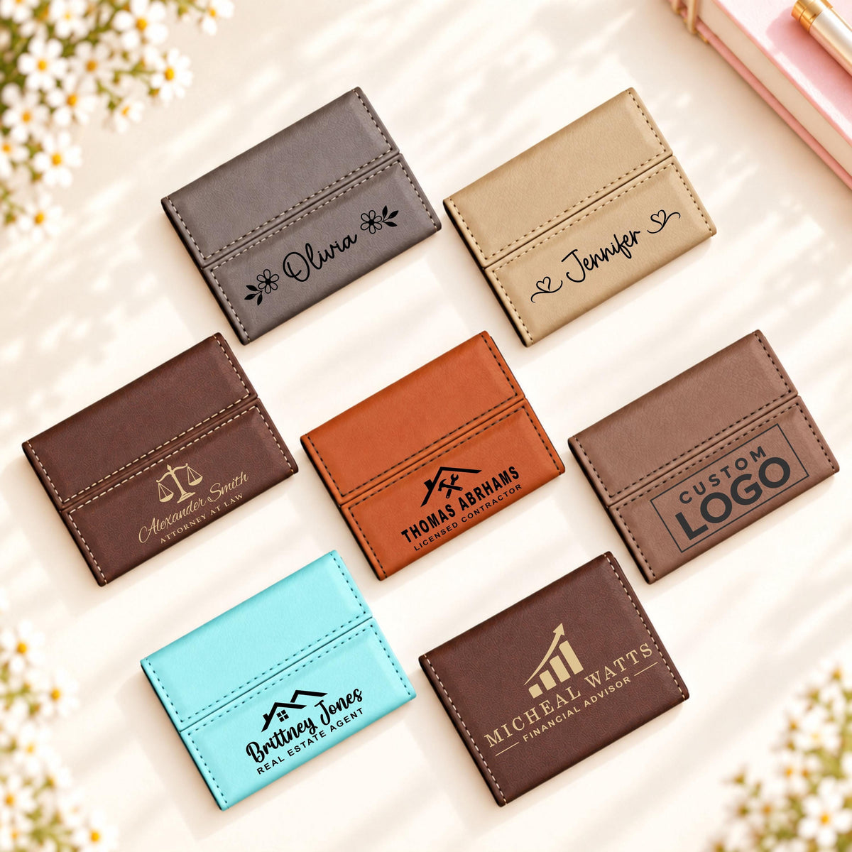 Personalized leatherette business card holders in seven colors with engraved names and designs