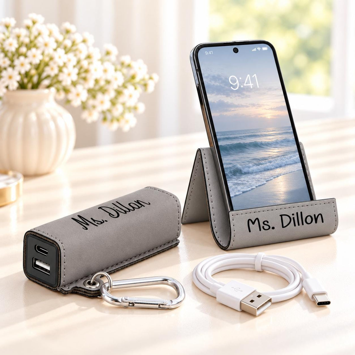 Grey phone stand and power bank set engraved Ms. Dillon